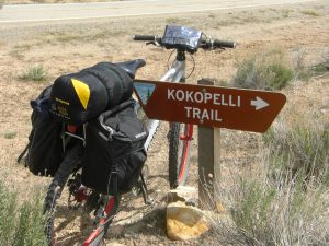 My rig next to the Kokopelli's Trail sign marking the beginning of the Yello Jacket Canyon section of the trail.
