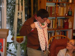 Dave models a lovely bib and matching suit. It looks a little small.