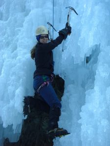 Gretchen climbing some ice in Ouray.
