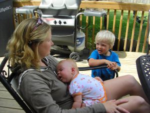 Phoebe takes a nap with Aunt Jennifer while Alexander watches.