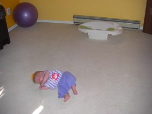 Phoebe takes a nap on her bedroom floor.