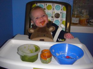 A big dinner: homemade green beans, carrots, and rice cereal.