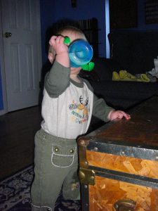 Such a big girl, drinking from her own sippy cup!