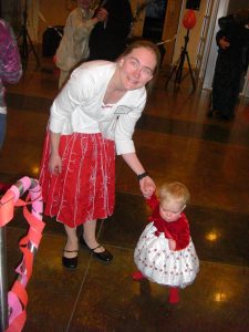 Phoebe can walk holding only one hand!