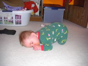 So pathetic...she was so tired she had to nap on the floor.