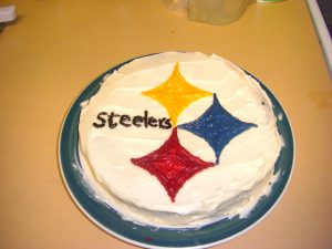 This year's version of a Steelers cake. Jess is getting pretty good at making hypocycloids with icing.