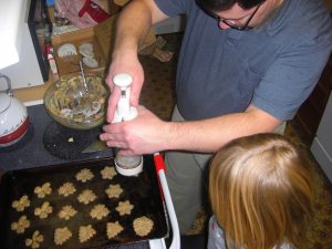 Dave is working on spritzes. Turns out that mixing red and green food coloring too vigorously makes brown!