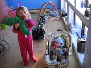 Phoebe asked me to take a picture of her with Benjamin. Note that he's ready to go and she's still wearing pajamas.