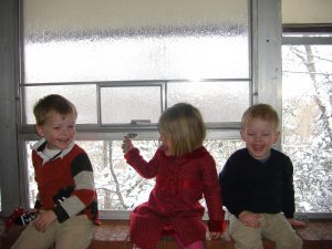 John, Phoebe, and Thomas at church.