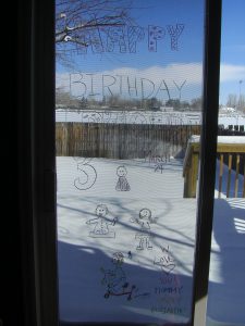 Drawing a tricycle is not my strong suit. Phoebe erased this window art birthday card about ten minutes after seeing it.