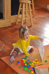 Marin working on a puzzle.