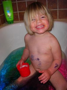 Phoebe drew tattoos on her stomach and enjoyed putting some fizzy colors into her bath.