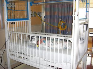 Benjamin in his crib at the hospital.