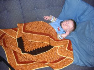 Taking a nap after coming home from the hospital.