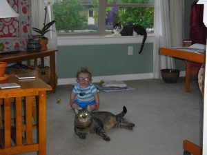 With Jehanne's cats, Strider (in front) and Pippin (in the window). Benjamin and Strider are the same approximate weight.