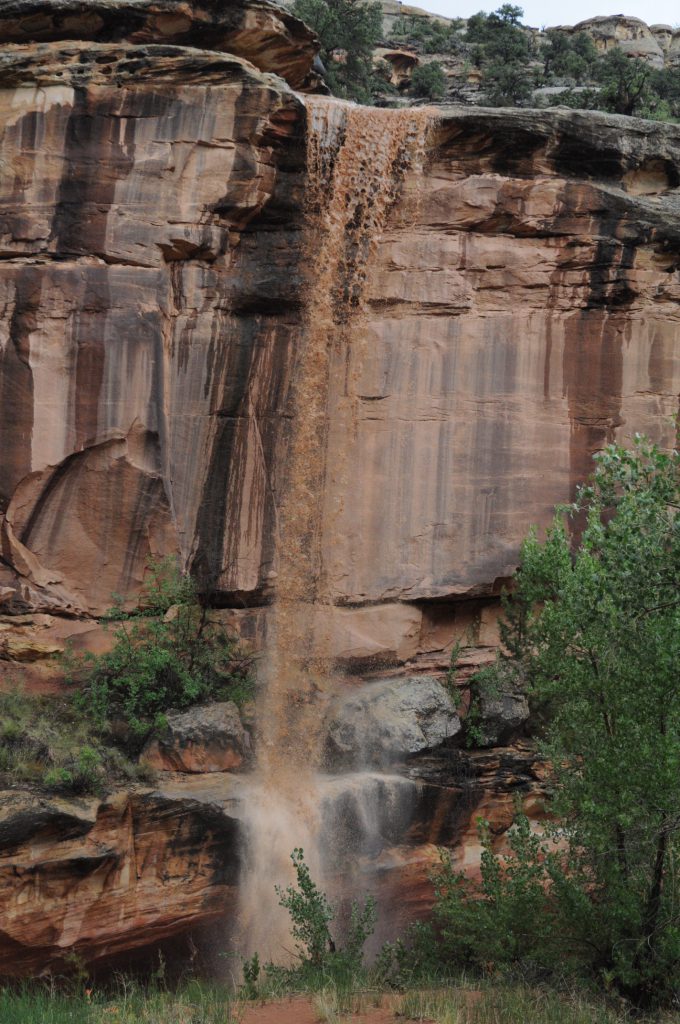 A short-lived, muddy waterfall in Capitol Reef national Monument.