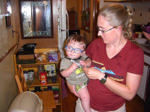 Benjamin's first lick of a beater. (You can tell he's a second child; Phoebe had to wait much longer!)