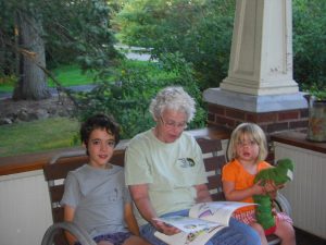 Aunt Nancy reads to Evers and Phoebe.