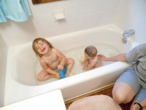 Benjamin's first bath in the regular bathtub.