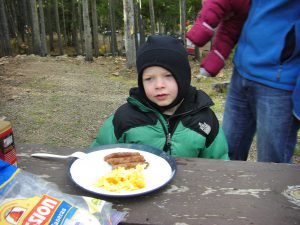 John eats a hearty breakfast.