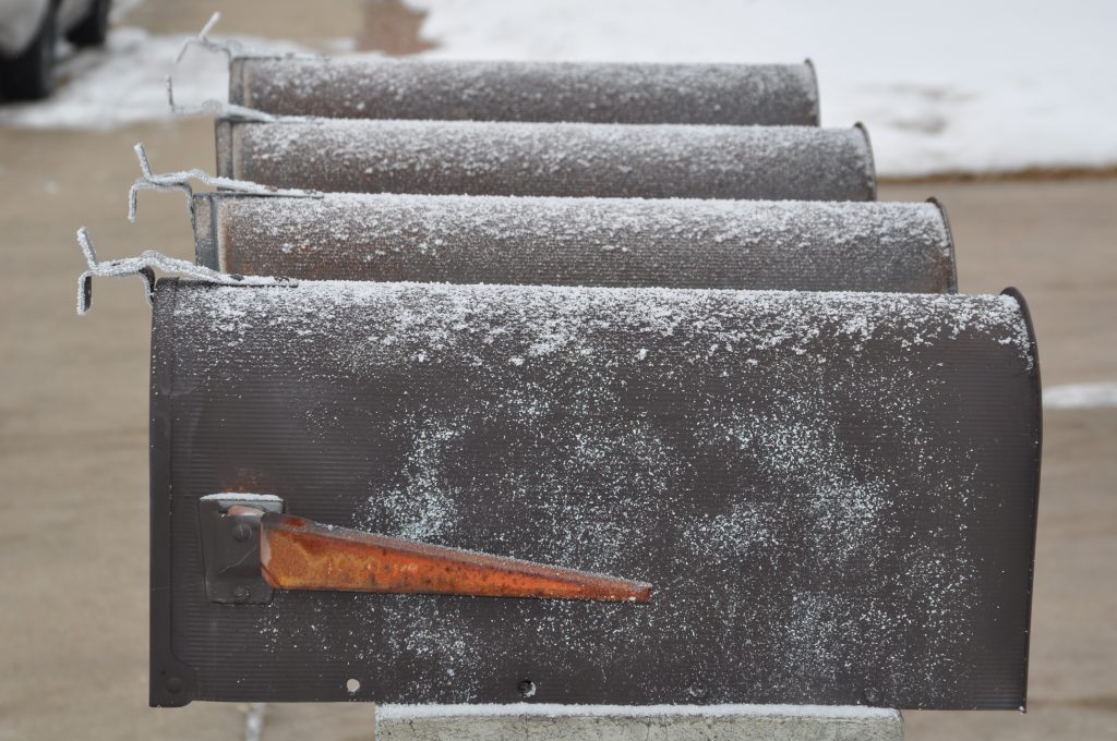 Some very cold looking mailboxes.