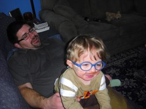 Climbing on Dad.
