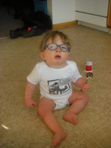 Freddie Mercury onesie. Must be at Auntie Elaina's house!