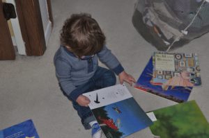Reading a book.
