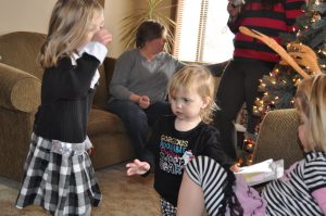 Genevieve and Cordelia enjoy Christmas day at Grandpa and Grandma Gribble's.
