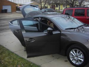 Dave's new car. I'm pretty sure it's going to be named Chocolate Chipmunk (or just Chocolate). It's a brown Mazda 3, and it's getting great gas mileage so far!