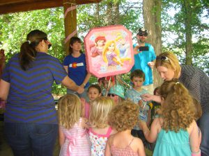 Pinata with strings to pull. Pretty good idea for little kids!