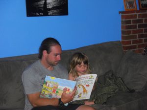Uncle Matt reading Richard Scarry.