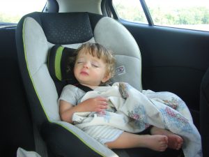 Benjamin looks like a little angel asleep with his curly hair.