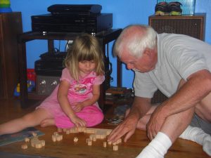 Grandpa helps Phoebe with one of Uncle Matt's puzzles...or is it the other way around?