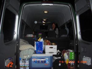 The back of the van, stocked with supplies.