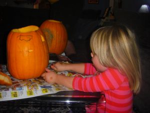 Cutting all by herself.