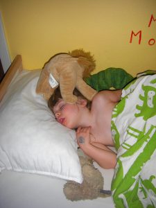 Phoebe asleep with Mommy Lion keeping her safe.