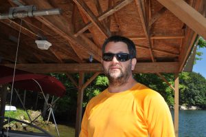 Lee next to the boat lift.