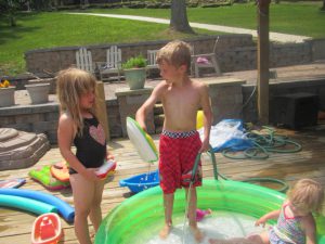 Conversation around the baby pool.