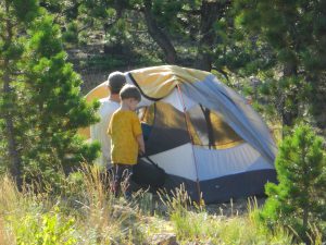 Andrew and Whit putting up a tent.