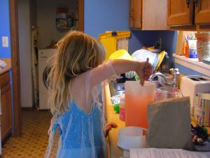 Elsa making lemonade.