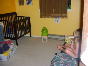 Both kids absorbed in their books.