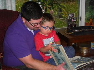 Daddy and Benjamin reading Where the Wild Things Are.