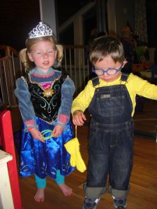 Benjamin the minion with Sarah dressed as Anna from Frozen.