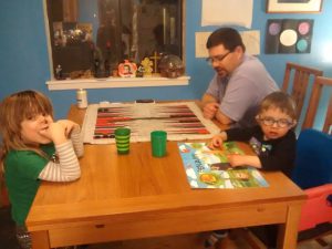Fun family night! Dave taught us all to play backgammon.