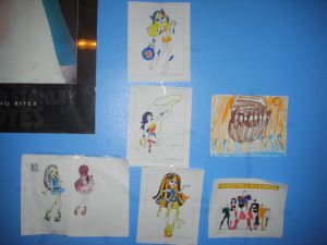 The pictures Phoebe colored and hung as decorations for her party.