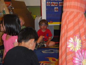 End-of-preschool celebration day! Benjamin is waiting for the singing to begin.