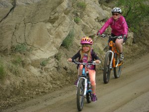 Mommy and Phoebe biking through the tunnels.