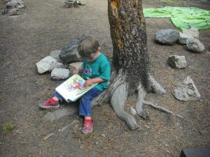 Benjamin found something to keep him busy while we broke down the campsite. He's reading Fred and Ted Go Camping