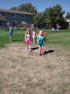 Phoebe and Kylie sprinting down the home stretch.